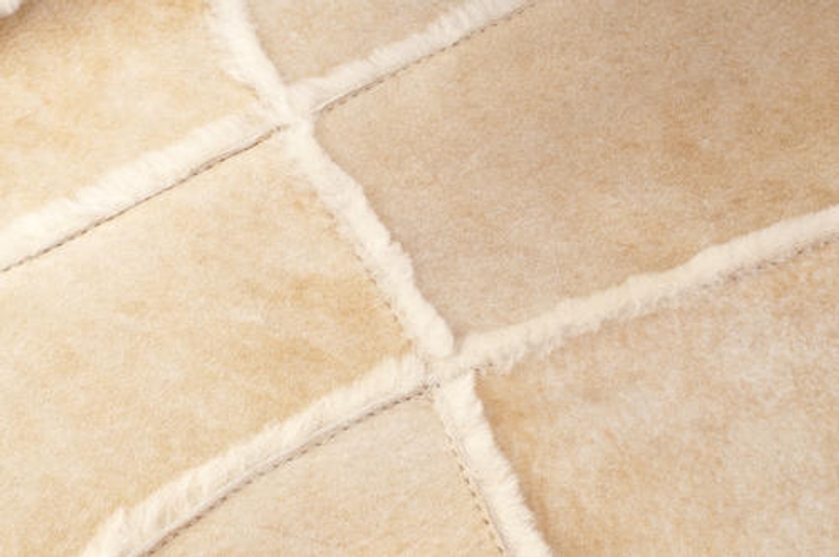 Manteau en peau lainée