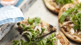 Minipizzas au crabe des neiges et à la roquette de Ricardo
